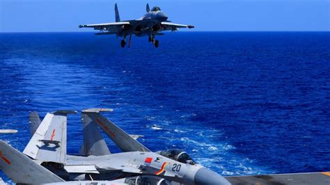 China accuses US of interfering in training exercise before aerial confrontation